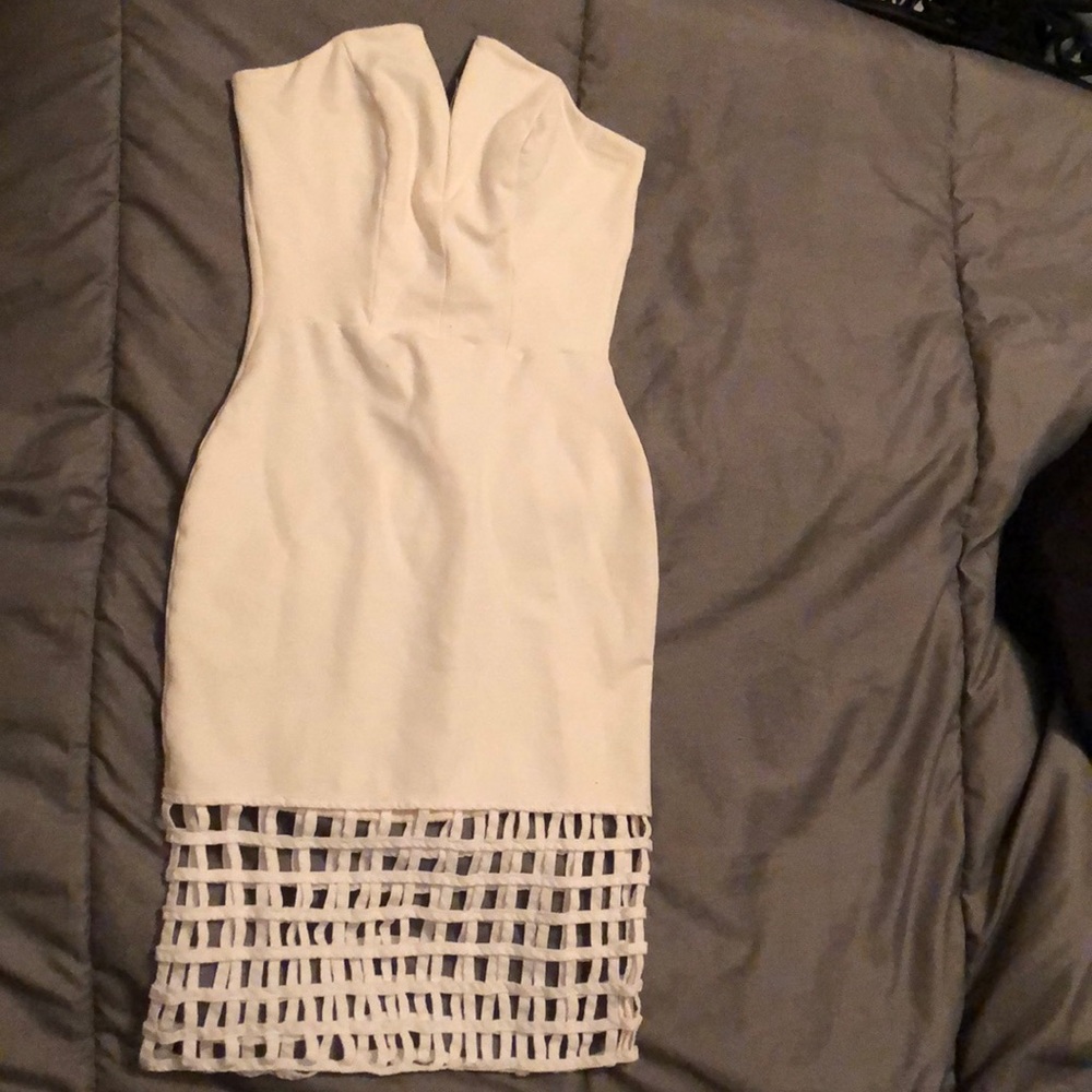 All white, body-con dress with box pattern at trim